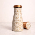 White ceramic bottle