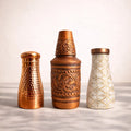 Three decorative bottles
